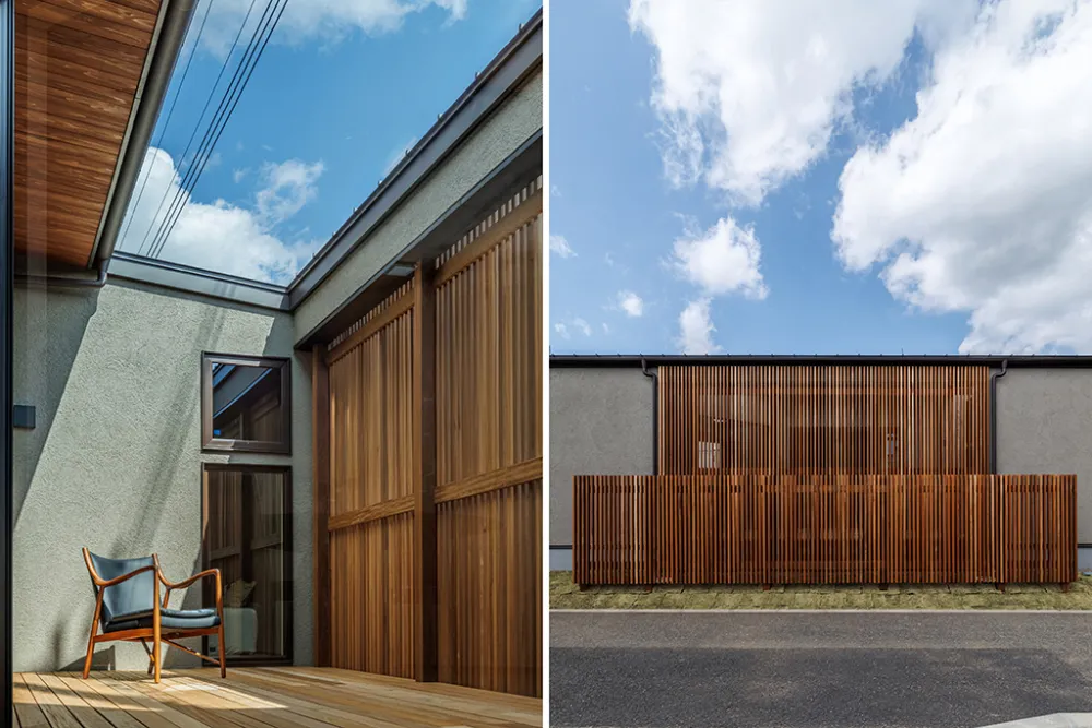 無垢材の縦格子が視線を遮る、プライバシー性の高いウッドデッキ